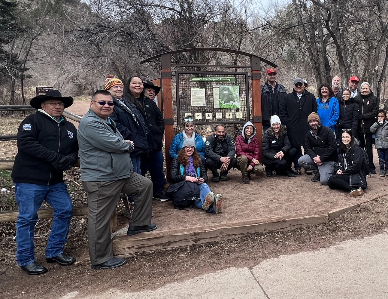 Tribal Representatives and City of Boulder Open Space and Mountain Parks staff gathered at The Peoples' Crossing during a 2023 consultation visit.