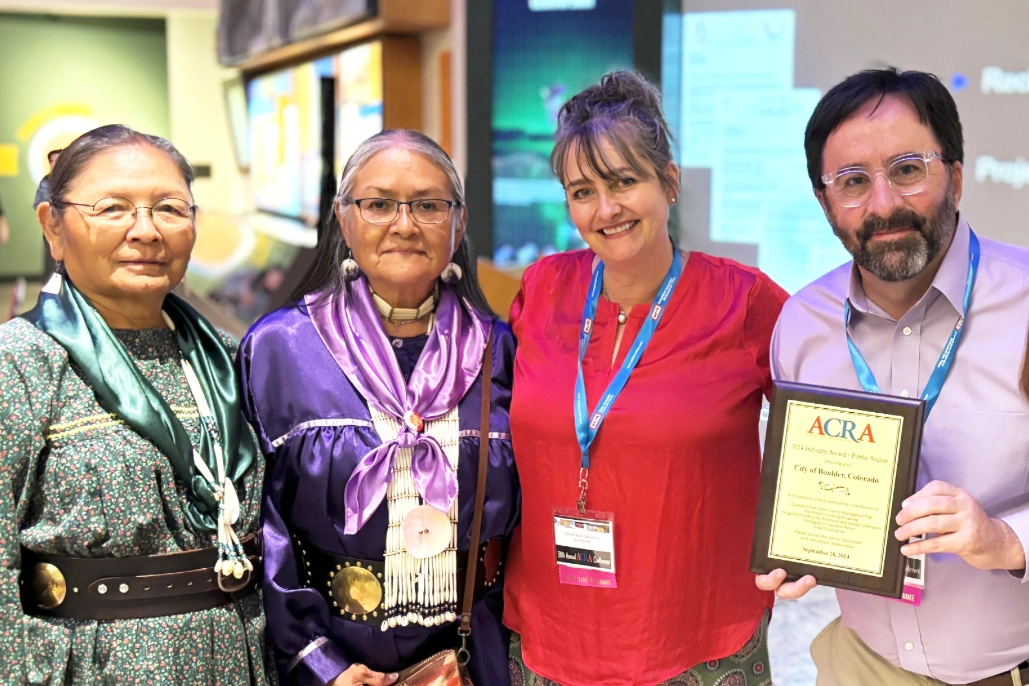 Phillip Yates with a City of Boulder colleague and Tribal Representatives from the Jicarilla Apache Nation holding the ACRA national award plaque.